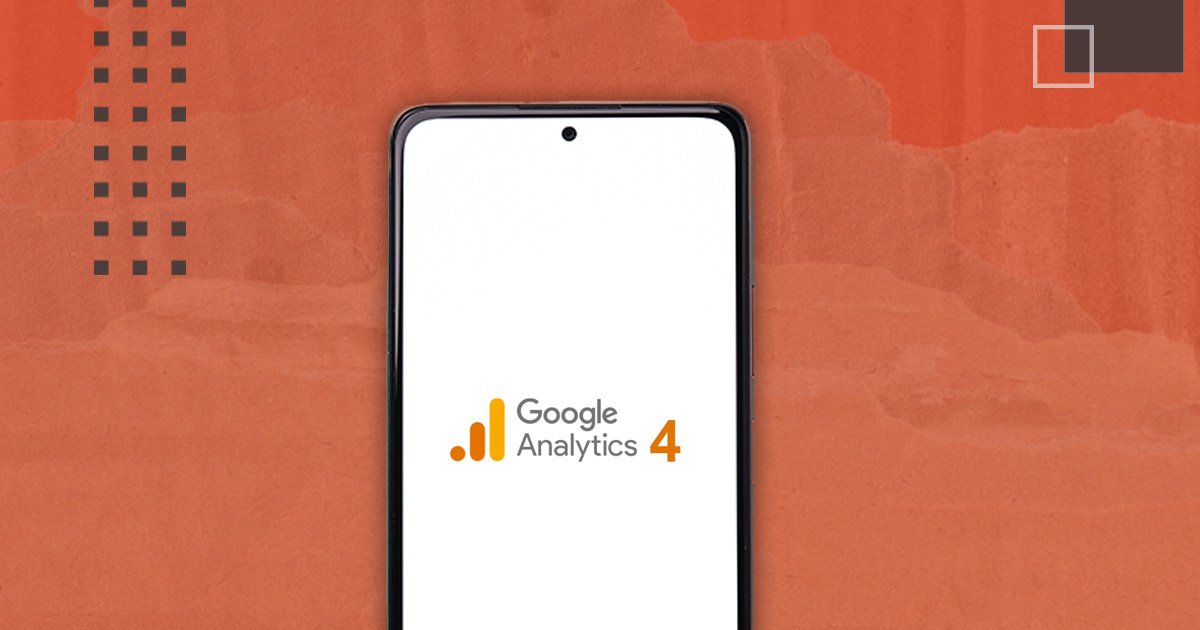 A mobile device displaying Google Analytics 4 in front of an orange textured backgrounds.