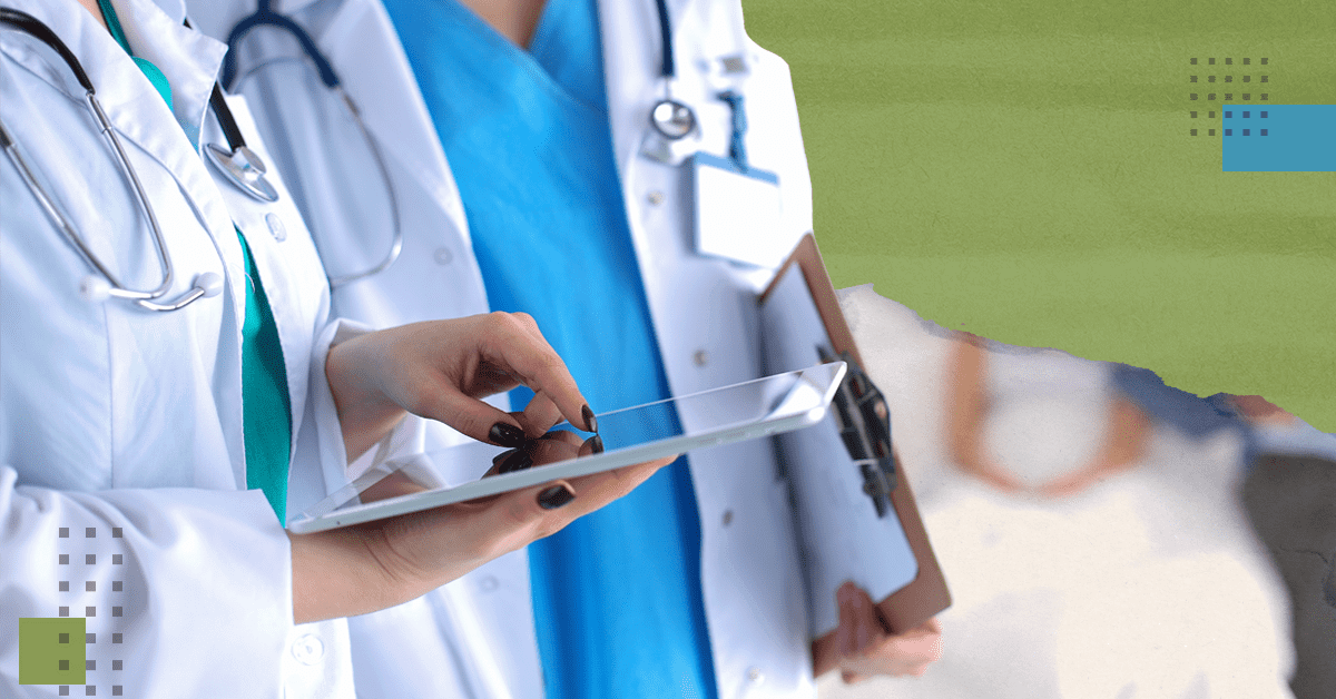 Physicians using tablets to work on digital marketing